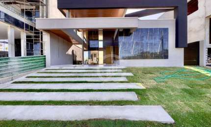 Casa com 3 dormitórios à venda, 195 m² por R$ 1.350.000,00 - Cidade Alpha - Eusébio/CE