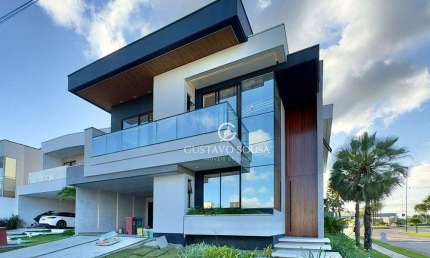 Casa com 4 dormitórios à venda, 306 m² por R$ 2.050.000,00 - Cidade Alpha - Eusébio/CE