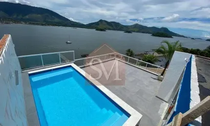 CASA TRIPLEX EM ANGRA DOS REIS DE FRENTE PARA O  MAR 5 SUÍTES COM 500M2 DE ÁREA CONSTRUIDA ....