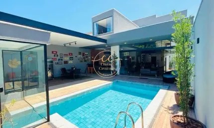 Recreio dos bandeirantes: casa contemporânea à venda com 5 suítes, 380m², 4 vagas, piscina e área gourmet.