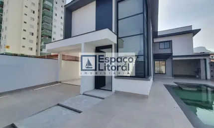 Sobrado novo com 4 dormitórios à venda, 245 m² por R$ 1.950.000,00 - Indaiá - Caraguatatuba/SP