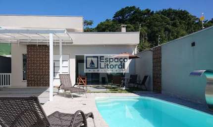 Casa com 3 dormitórios à venda, 107 m² por R$ 960.000,00 - Massaguaçu - Caraguatatuba/SP