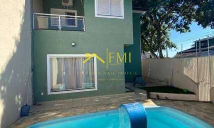Casa com 4 quartos sendo 2 suítes área gourmet e piscina no Villa Branca