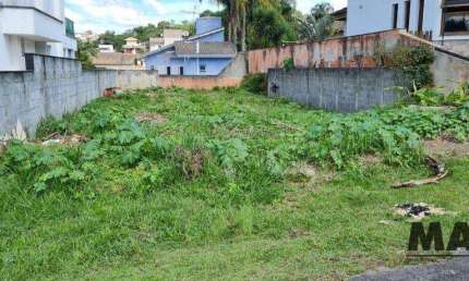 Terreno à venda, 300 m² por R$ 690.000,00 - Condomínio Aruã - Mogi das Cruzes/SP