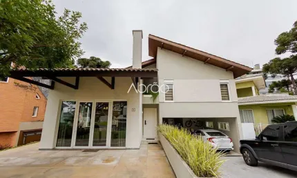 Casa em condomínio semimobiliada com 4 quartos no Ecoville - 500 m² | Ref 412
