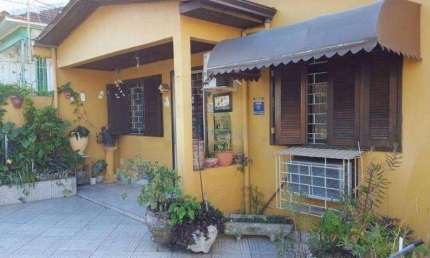 Casa à Venda no Bairro Itú Sabará , Pátio com Edícula.