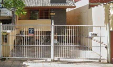 Casa comercial à Venda 315m² mobiliada, Bairro Auxiliadora, 3 dormitorios , 1 suite , 4 banheiros, Split, Piscina, Placas de Aquecimento Solar, 2 vagas de garagem, varanda ,churrasqueira, e sacada