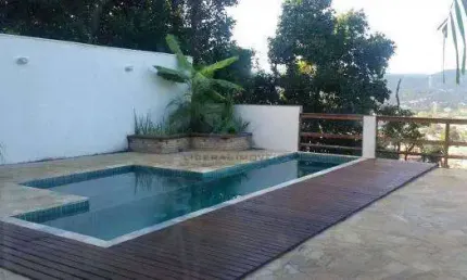 Casa em condomínio fechado com 4 quartos à venda na Rua Antônio Rusch, Maria Paula, São Gonçalo, 205 m2 por R$ 650.000