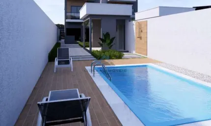 Casa com 3 quartos à venda na Rua Walter Muniz dos Santos, Jardim Atlântico Central (Itaipuaçu), Maricá, 130 m2 por R$ 558.000