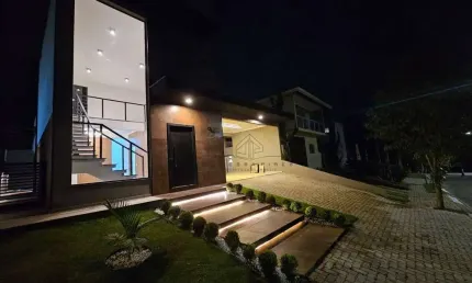 CASA TERREA IMPONENTE COM PE DIREITO ALTO MEZANINO 03 SUITES CONDOMINIO TERRAS DE ATIBAIA