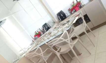 Apartamento Edificio Bonardi composto de 2 domitórios, sala americana e 1 vaga de gargem