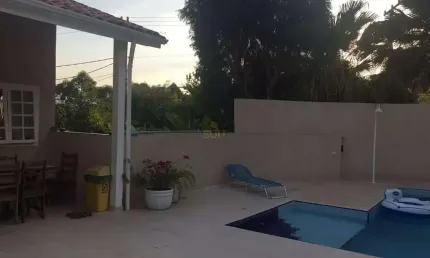 Alphaville 3 - Casa com 420m², 5 Suítes, 4 Vagas, Piscina e Muito Lazer no Cond.