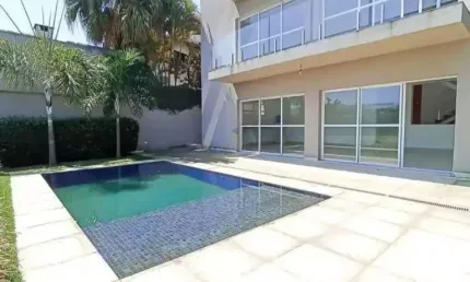 Alphaville 6 - Casa com 488m², 4 Suítes, 5 Vagas e Espaço Gourmet em Santana de