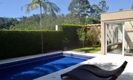 Casa com 4 dormitórios à venda, 450 m² por R$ 6.890.000 - Tamboré - Santana de P