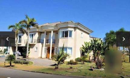 Casa com 5 dormitórios à venda, 618 m² por R$ 4.200.000 - Residencial Doze (Alph