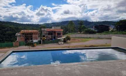 Casa com 4 dormitórios à venda, 400 m² por R$ 4.900.000 - Tamboré - Santana de P