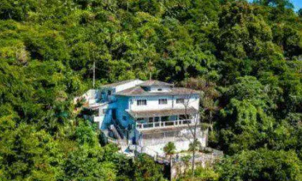 Casa com 3 dormitórios à venda, 384 m² por R$ 1.800.000,00 - Cigarras - São Sebastião/SP