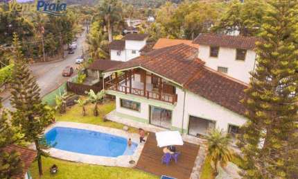 Casa em ampla terreno com 4 suítes à venda, 593 m² por R$ 12.000.000 - Água Branca - Ilhabela/SP