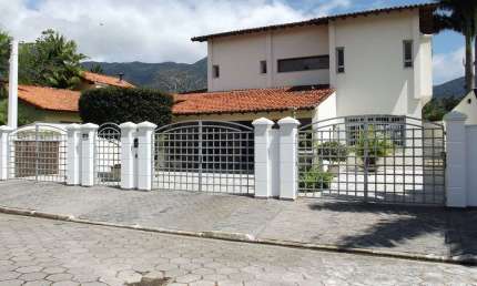 Casa com 3 dormitórios, 420 m² - venda por R$ 1.800.000,00 ou aluguel por R$ 7.000,00/mês - Arrastão - São Sebastião/SP