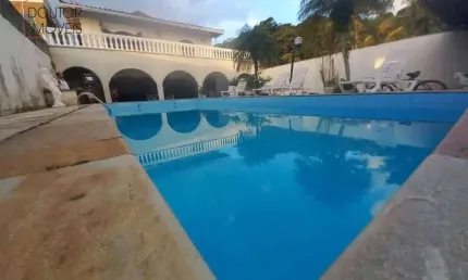 Casa com 5 dormitórios à venda, 350 m² por R$ 1.200.000,00 - Balneário Praia do Pernambuco - Guarujá/SP