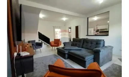 SOBRADO A VENDA, INDAIA, BERTIOGA/SP - 2 SUÍTES, SALA, COZINHA, BANHEIRO SOCIAL, 2 VAGAS DE GARAGEM E CHURRASQUEIRA