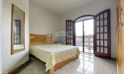 Sobrado com 3 quartos para alugar por R$3.350,00/mês - Pé na areia - Vista Linda -Bertioga - SP.