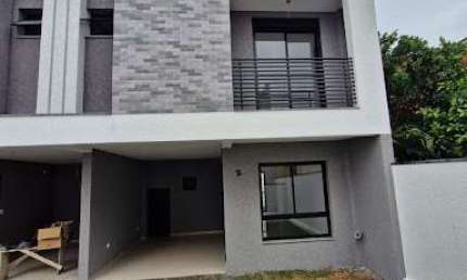 Sobrado com 3 dormitórios à venda, 127 m² por R$ 699.000 - Uberaba - Curitiba/PR
