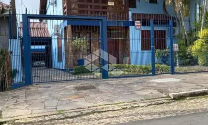 Casa com 4 quartos à venda na Rua Ararás, 344, Sarandi, Porto Alegre, 292 m2 por R$ 1.200.000