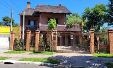 Casa com 3 quartos à venda na Rua Conselheiro D'Ávila, 632, Jardim Floresta, Porto Alegre, 212 m2 por R$ 980.000
