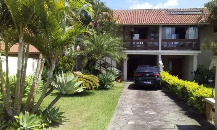 Casa em condomínio fechado com 3 quartos à venda na Avenida Eduardo Prado, 2050, Cavalhada, Porto Alegre, 234 m2 por R$ 975.000