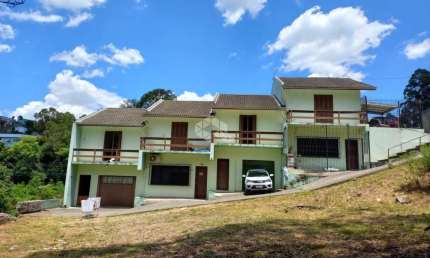 Casa com 2 quartos à venda na Avenida dos Girassóis, 538, Charqueadas, Caxias do Sul, 69 m2 por R$ 249.990