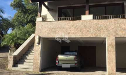 Casa em condomínio fechado com 3 quartos à venda na Rua Maracá, 240, Vila Assunção, Porto Alegre, 555 m2 por R$ 2.450.000