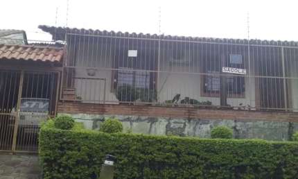 Casa com 3 quartos à venda na Rua Abram Goldsztein, 59, Jardim Carvalho, Porto Alegre, 104 m2 por R$ 389.999