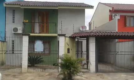 Casa em condomínio fechado com 3 quartos à venda na Rua Martinho Lutero, 508, Harmonia, Canoas, 150 m2 por R$ 445.000