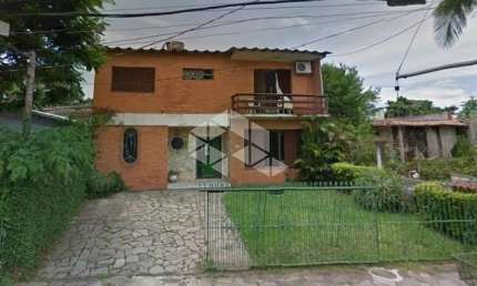 Casa com 3 quartos à venda na Rua Jacundá, 670, Guarujá, Porto Alegre, 245 m2 por R$ 530.000
