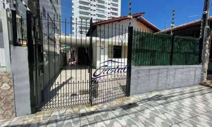 Casa com 2 dormitórios à venda, 130 m² por R$ 390.000 - Caiçara - Praia Grande/SP