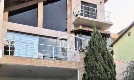 Casa com 3 dormitórios à venda, 215 m² por R$ 1.100.000,00 - Parque Nova Jandira - Jandira/SP