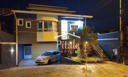 Casa com 3 dormitórios à venda, 369 m² por R$ 1.300.000 - Parque Nova Jandira - Jandira/SP