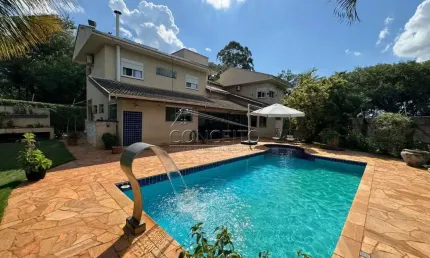 Casa térrea à venda no bairro Santa Rita com 392 m² | 4 suítes e 4 vagas de garagem