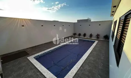 Casa residencial disponível para venda no bairro Quinta Alto Umuarama em Uberlândia - MG.