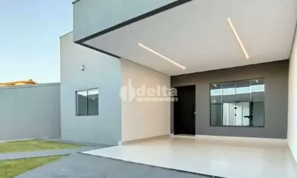 Casa residencial disponível para venda no bairro Jardim Holanda em Uberlândia-MG.