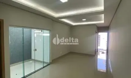 Casa residencial disponível para venda no bairro Jardim Brasília em Uberlândia-MG