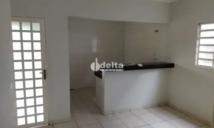 Casa residencial disponível para venda no bairro Jardim Brasília em Uberlândia-MG