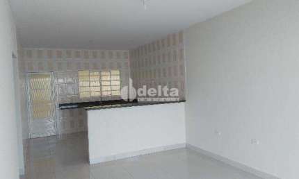 Casa residencial disponível para venda no bairro Jardim Holanda em Uberlândia - MG.