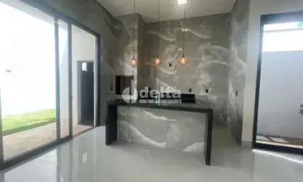 Casa residencial disponível para venda no bairro Quinta Alto Umuarama em Uberlândia - MG.