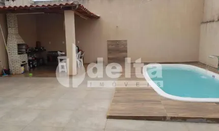 Casa residencial disponível para venda no bairro Jardim Holanda em Uberlândia - MG.