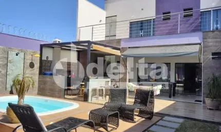 Casa residencial disponível para venda no bairro Loteamento Portal do Vale II em Uberlândia - MG.