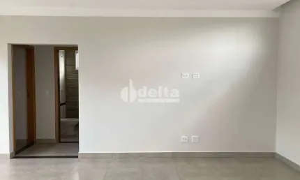 Casa residencial disponível para venda no bairro Jardim Canaã em Uberlândia-MG