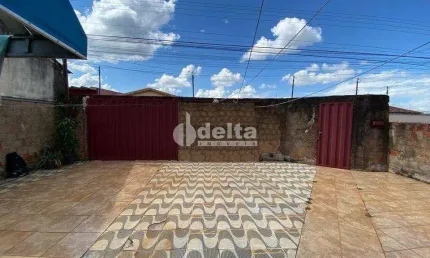 Casa residencial disponível para venda no bairro Custódio Pereira em Uberlândia-MG