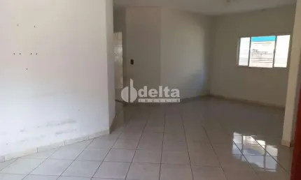 Casa residencial disponível para venda no bairro Custódio Pereira em Uberlândia-MG
